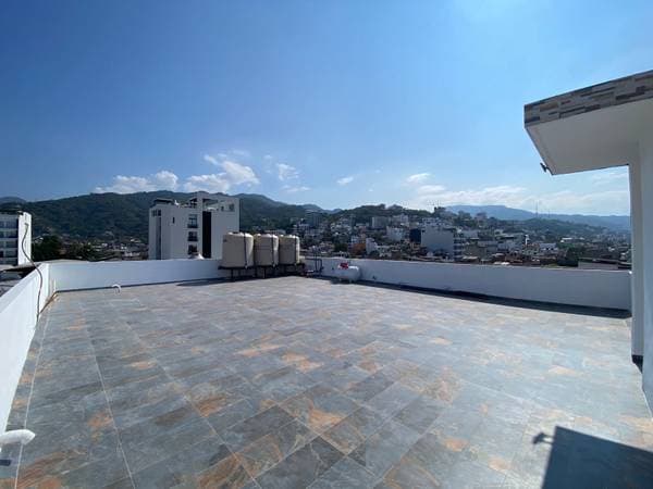 Large Studio Private Balcony Common Pool and Rooftop - Image 4